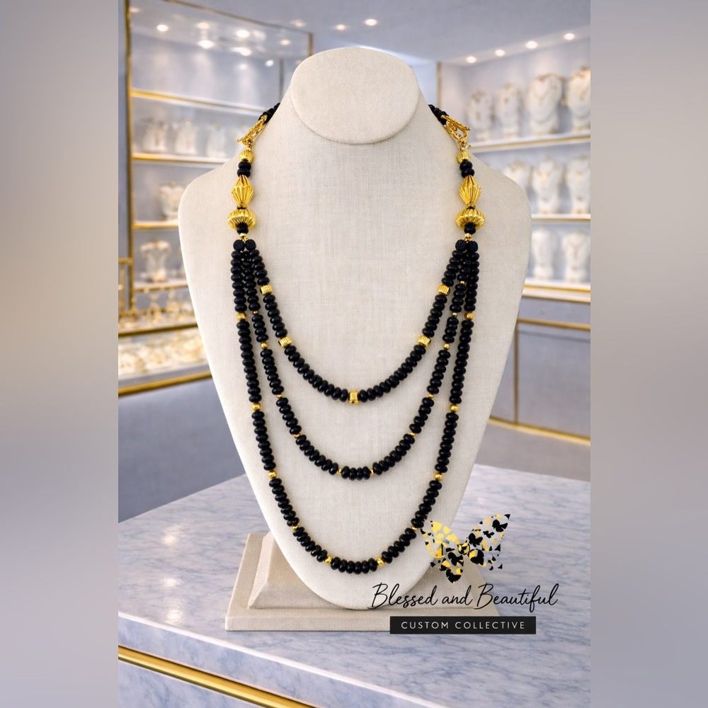BLACK AND GOLD RONDELLE THREE STRAND NECKLACE AND BRACELET SET.  WEAR TWO WAYS!